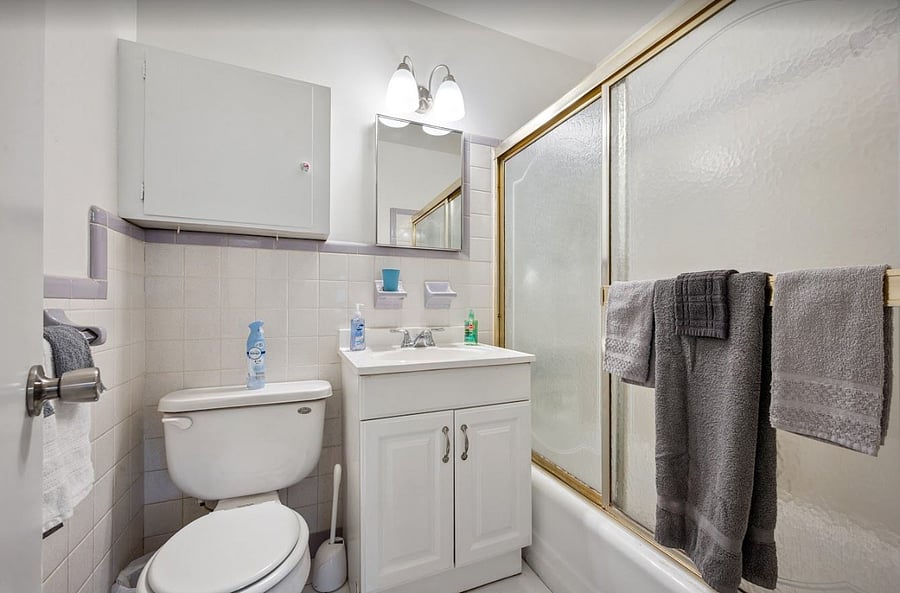 Master Bath with shower/tub enclosure. 