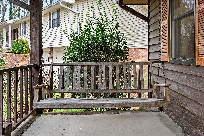 Porch swing on front porch