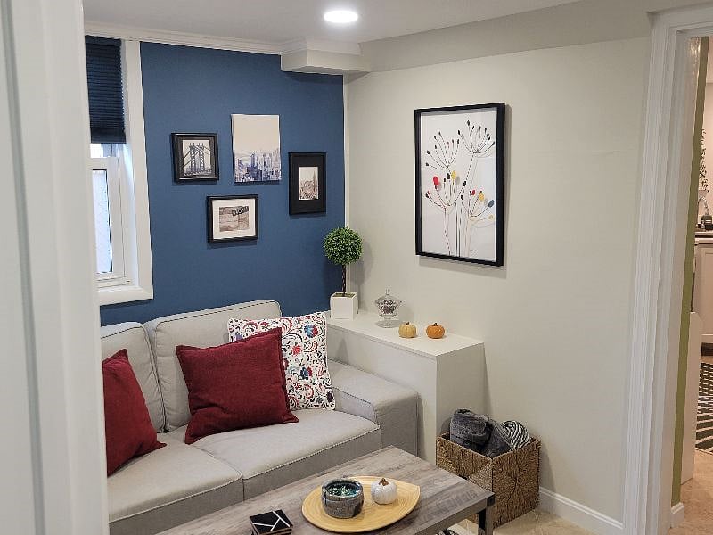 Modern living area with comfortable loveseat.