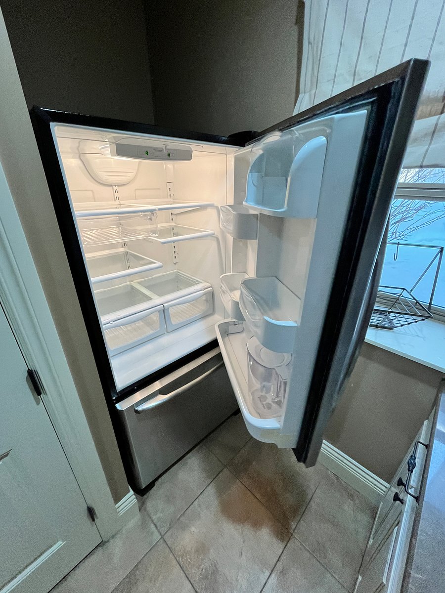 Full size refrigerator and bottom freezer