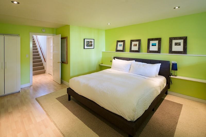 Large bedroom, comfortable bed.