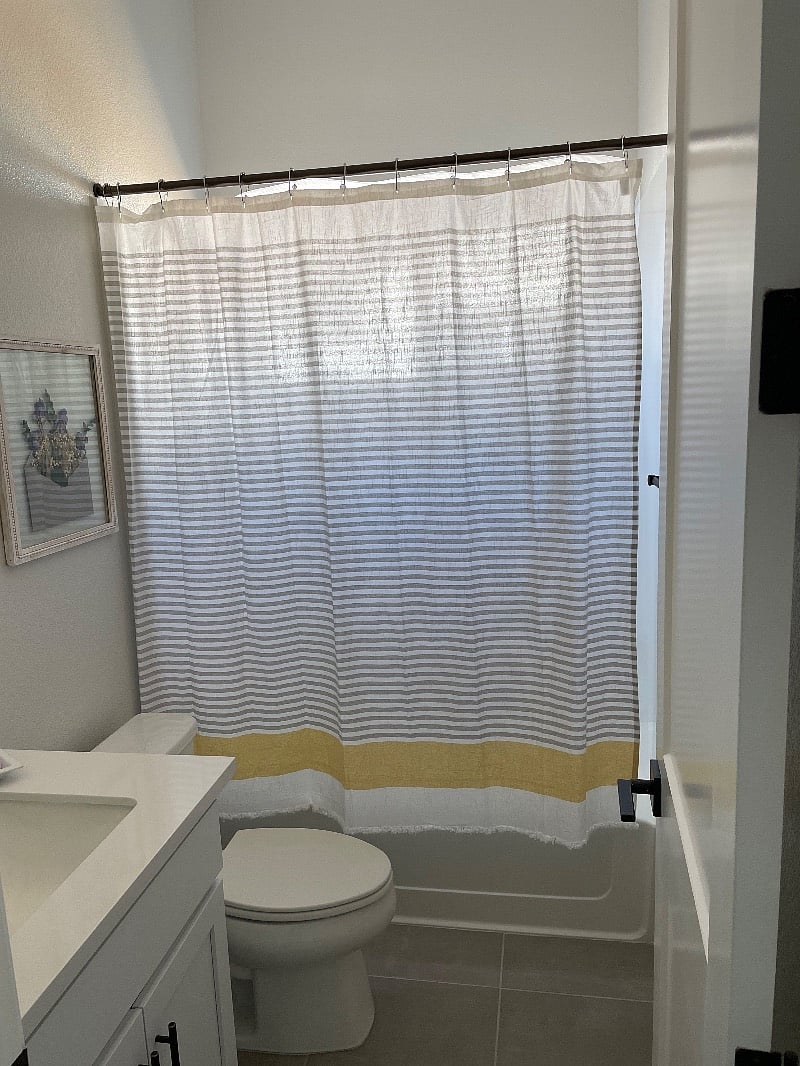 Your own bathroom with shower/tub combo.