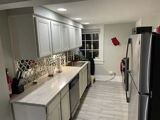Galley Kitchen with new stainless appliances