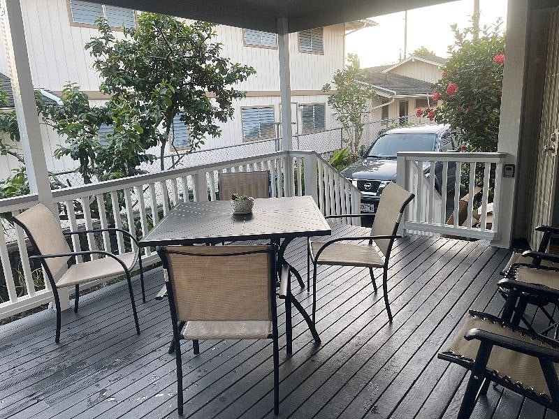Large comfortable Lanai with table and chairs, cooling fan