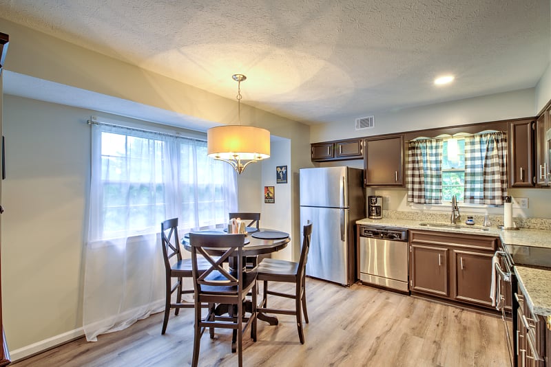 Kitchen has new granite tops, undermount sink, stainless appliances, plenty of cabinet space and a china hutch as well. Some cleaning supplies included.