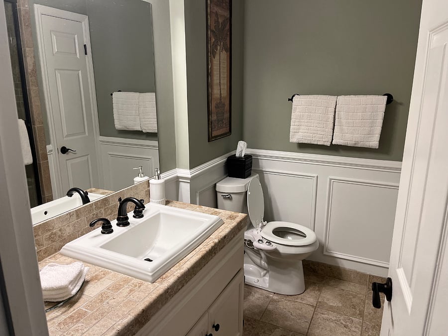 The Master bath features fresh towels, a starter set of soaps, shampoos, a bidet, and walk in shower with fixed and handheld shower heads