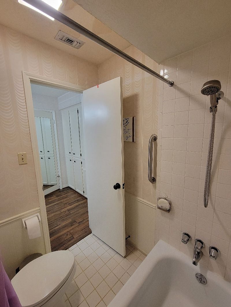 Toilet and Bathroom have its own door to separate from the sink. Handicap handle by the shower to help prevent slips and falls! Shower head pulls out for easy showering :)