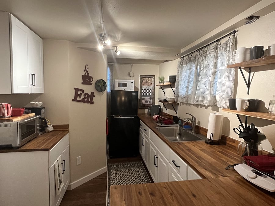 lots of storage in fully stocked kitchenette