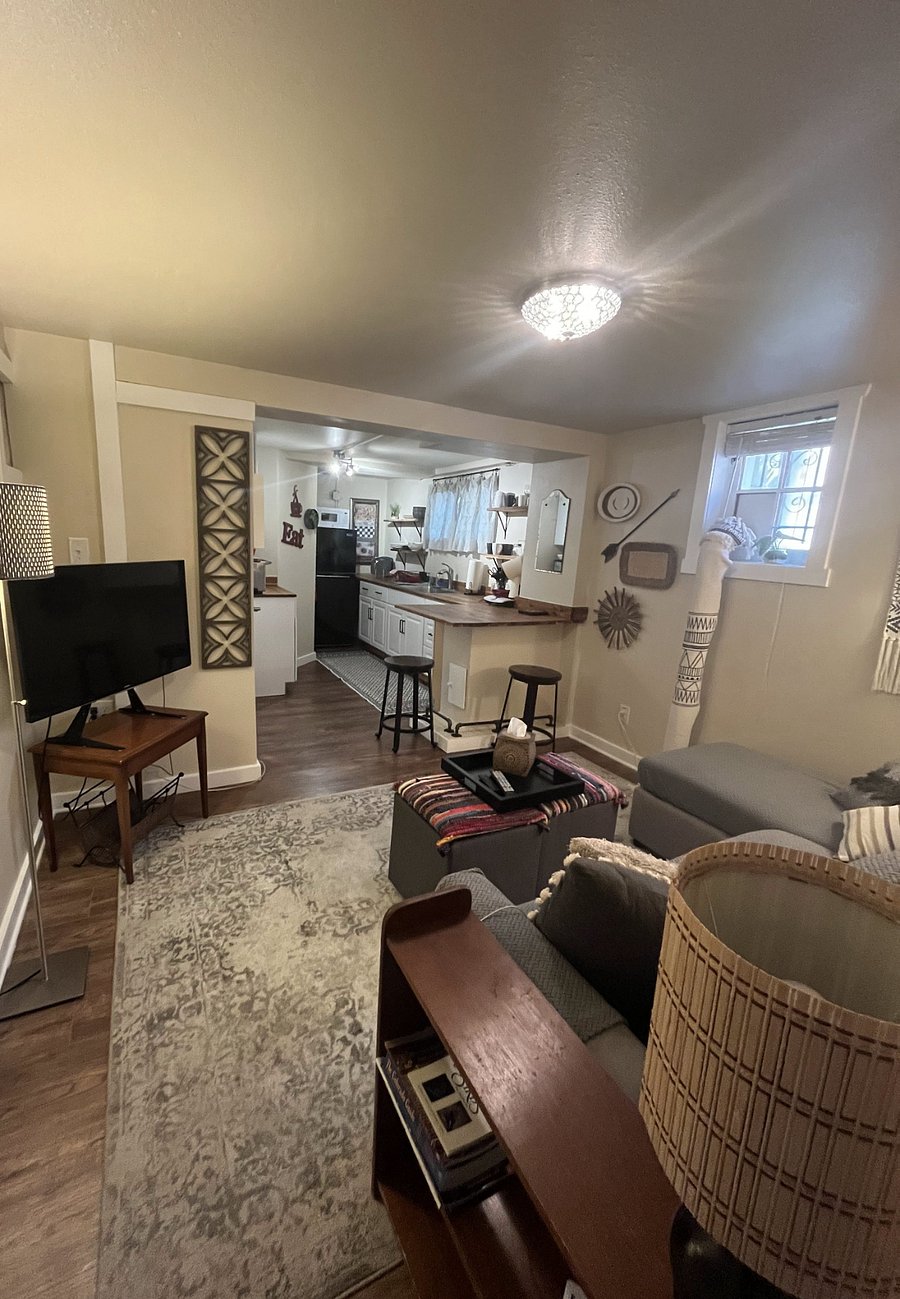 view of living room and kitchenette from bedroom
