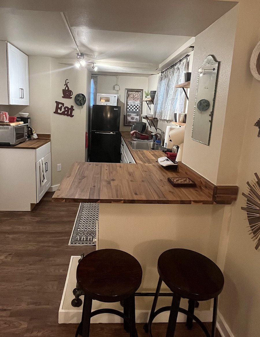 view of kitchenette from counter stools