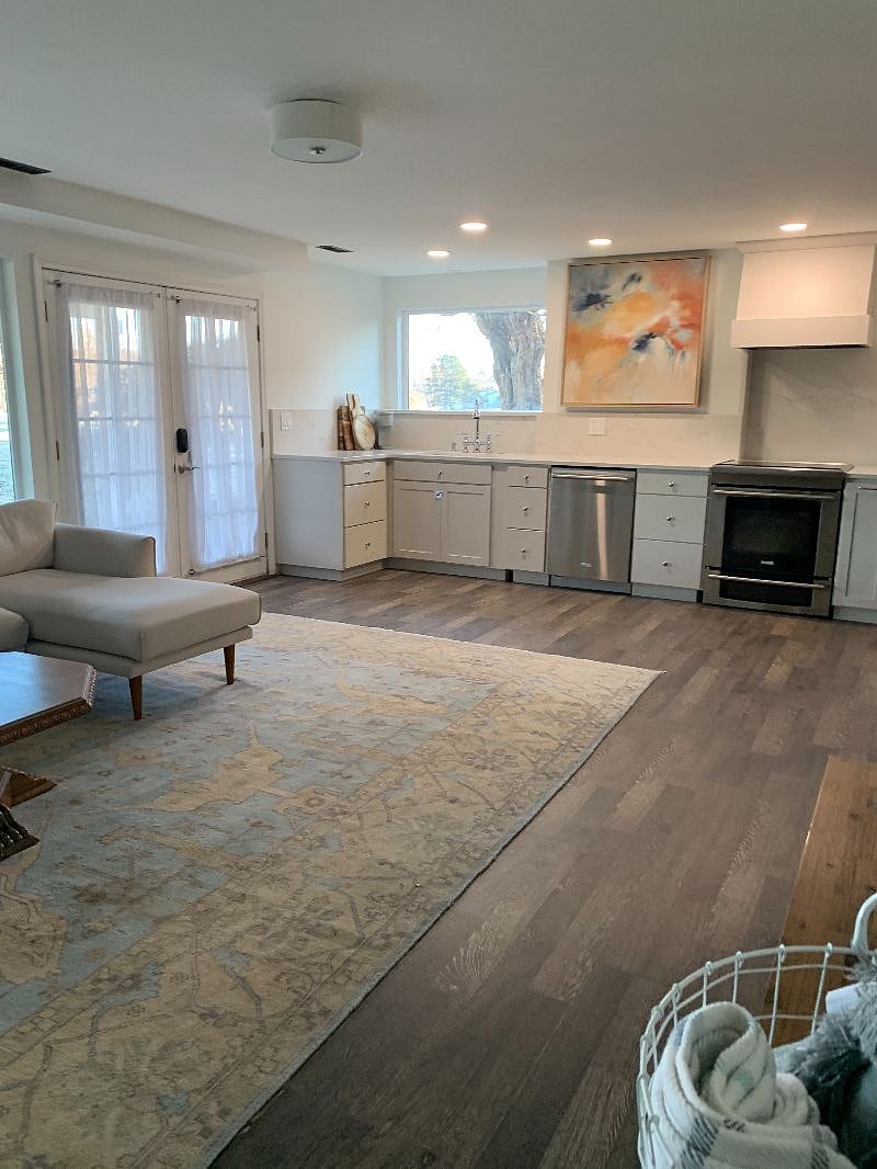 Full Kitchen, including large sink, dishwasher, stove, and fridge/freezer