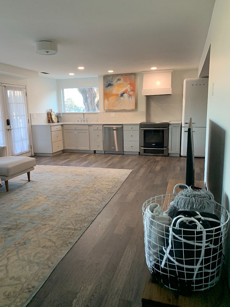 Large 55" Television in front of sectional