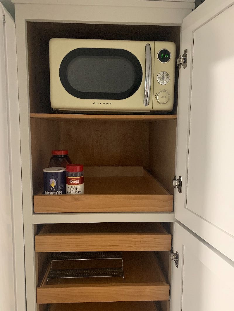 Microwave and ample pantry/food storage