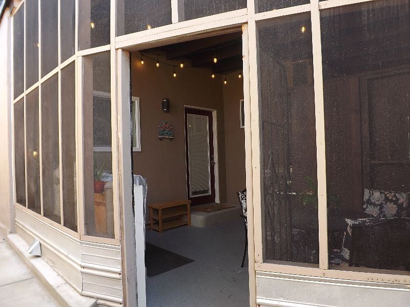 Entrance to the screened patio, leading to the studio entry door.