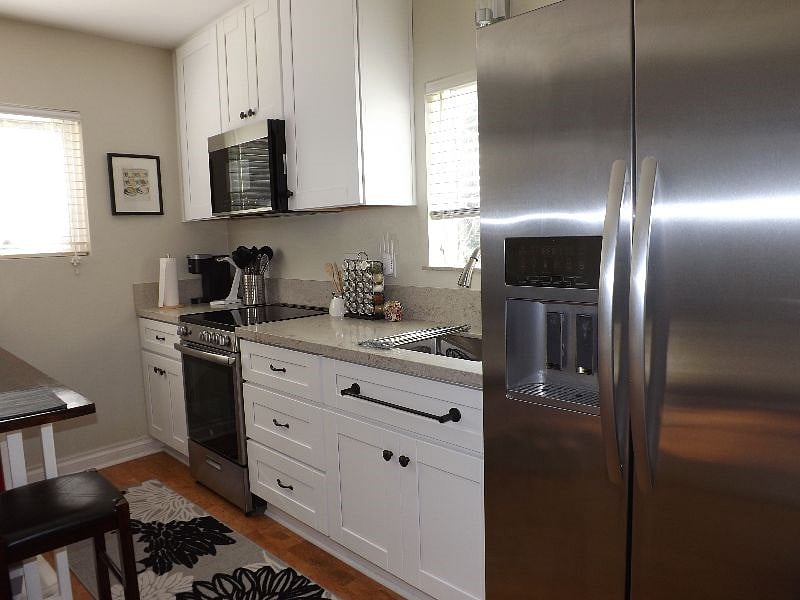 Kitchen includes a full-size (36-inch) Kitchenaid fridge with water/ice dispensers.  All filters are replaced every 6 months.