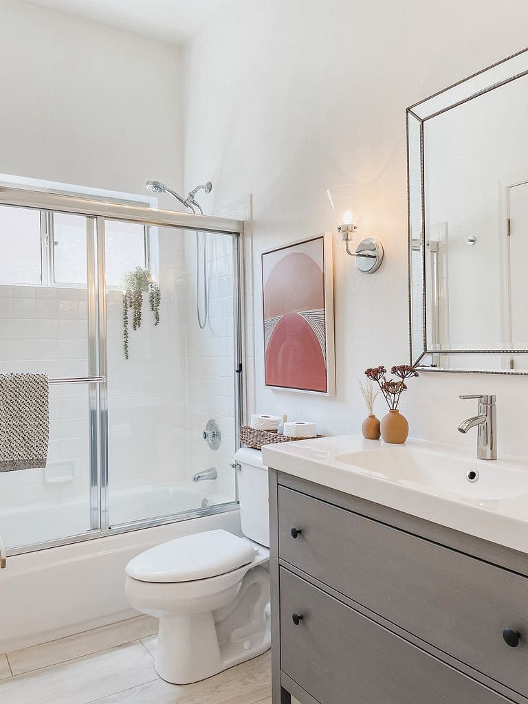 Tub/ shower combo, toilet and sink.