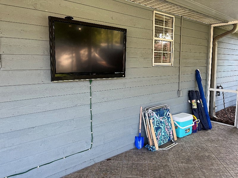 Outdoor Smart TV on covered patio for casual viewing