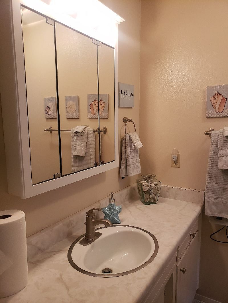 Nice clean bathroom with lots of storage.