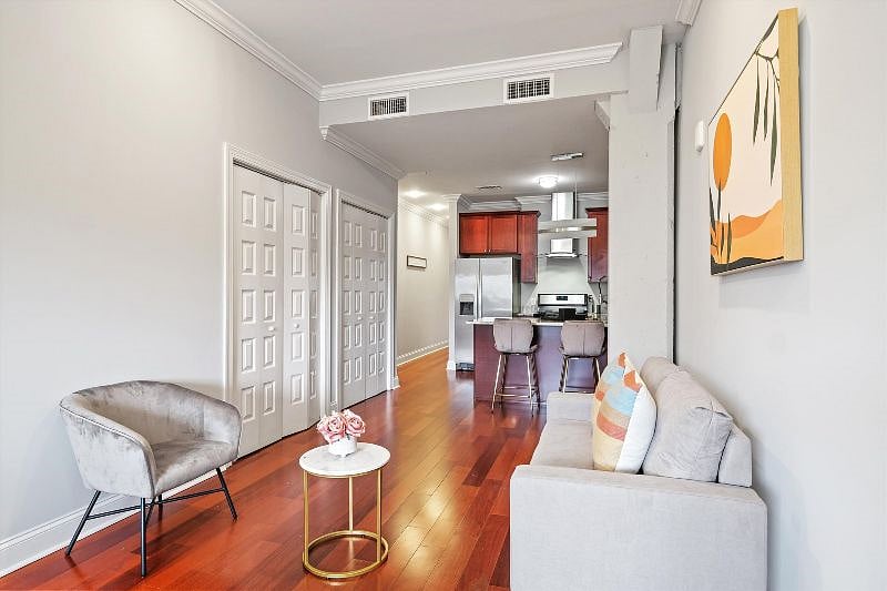 This thoughtfully designed open-concept layout seamlessly connects the living, dining, and kitchen areas, creating a harmonious flow filled with natural light and modern charm. It's a space made for effortless living, entertaining, and everyday comfort.