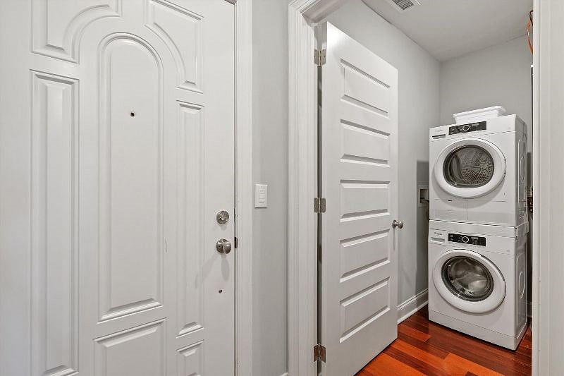 This bright and spacious laundry room combines functionality with style, featuring ample storage, clean finishes, and a layout designed for ease. It's a practical yet polished space that makes everyday chores feel effortless.