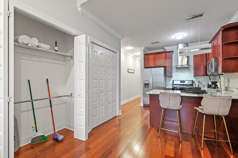 This thoughtfully designed open-concept layout seamlessly connects the living, dining, and kitchen areas, creating a harmonious flow filled with natural light and modern charm. It's a space made for effortless living, entertaining, and everyday comfort.