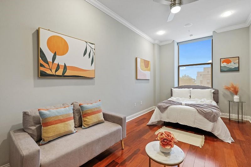 This serene and spacious bedroom offers a perfect retreat, with soft textures, calming tones, and an airy layout that invites rest and relaxation. Designed with both comfort and style in mind, its a peaceful escape from the everyday.