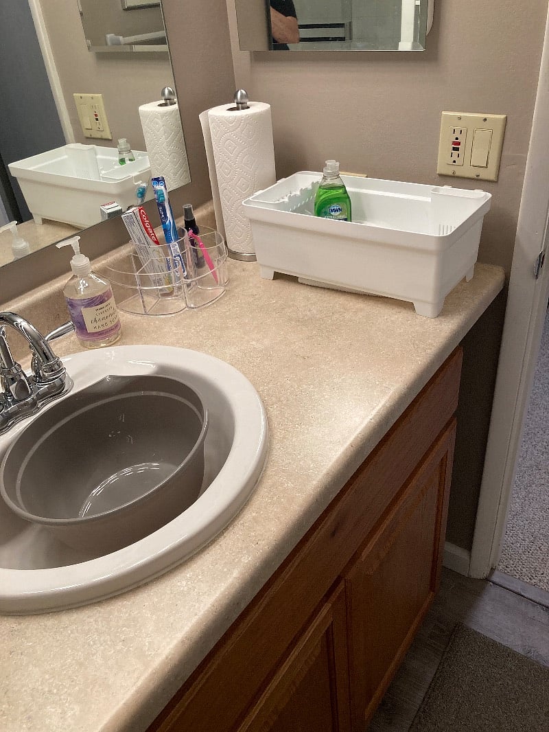 Room to wash dishes in private bathroom sink.
