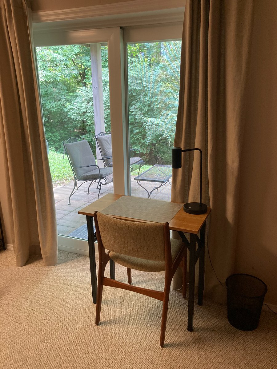 Table with view of woods.