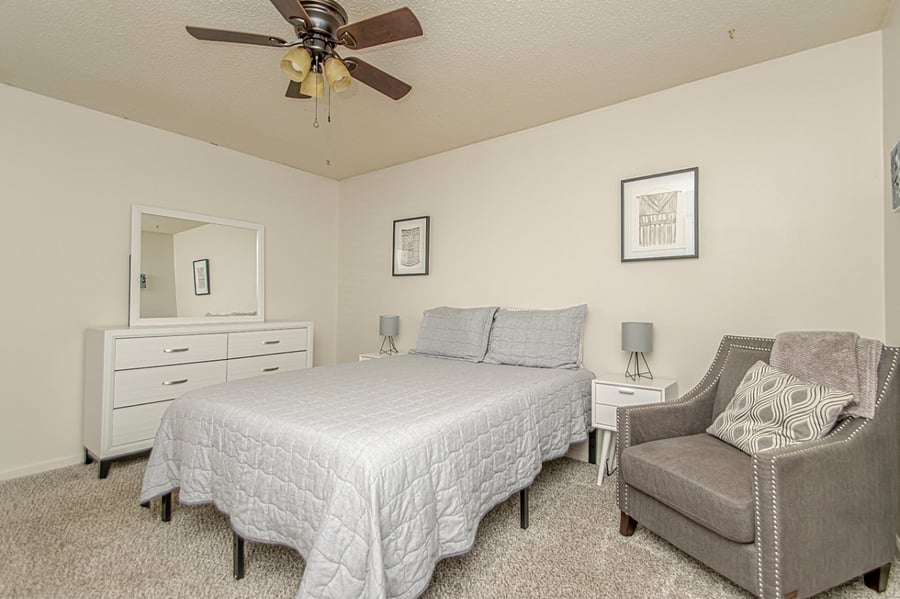Queen Bedroom with couch and dresser