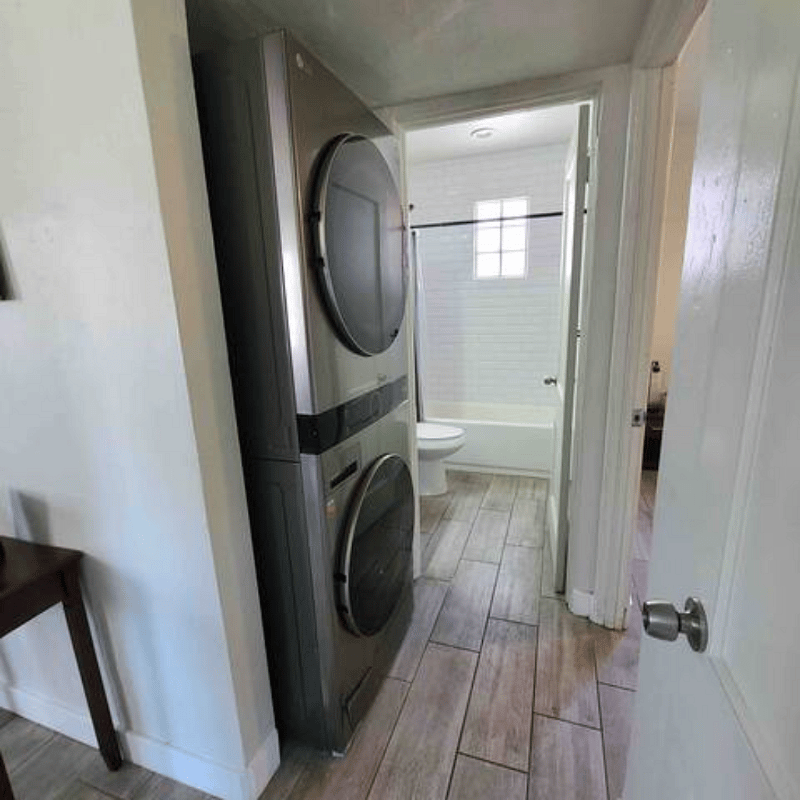 Full laundry in hallway.