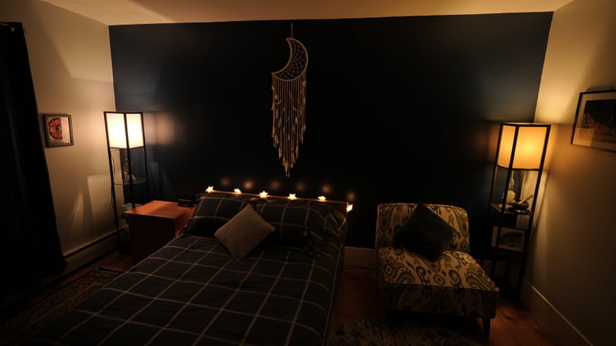 Room Darkening Curtains.
Photo taken at 10 am with shades and curtains drawn.
