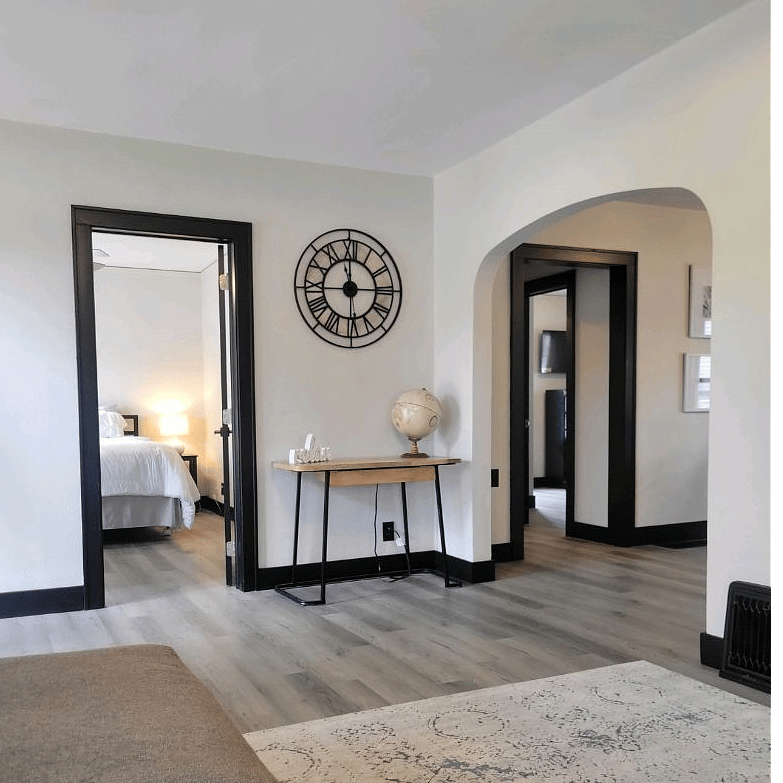 View of main bedroom from living room couch