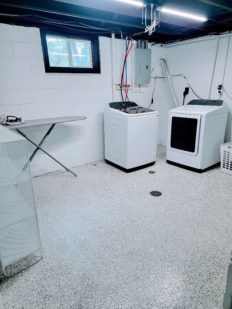 Lower level laundry with iron board
