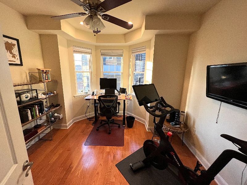 Second Floor Office or Bedroom. As shown: desk with monitor, shelving. (Alternate bedroom next photo as currently setup) PELETON REMOVED