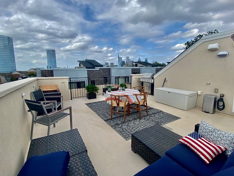 Beautiful views from the large roofdeck. New gas grill, large table with umbrella and 4 chairs, lounge furniture and plants.