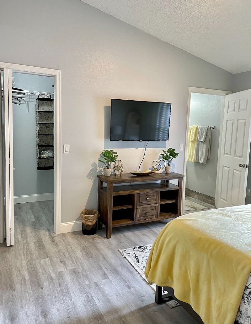 Master Bedroom closet, Roku TV, bathroom entrance