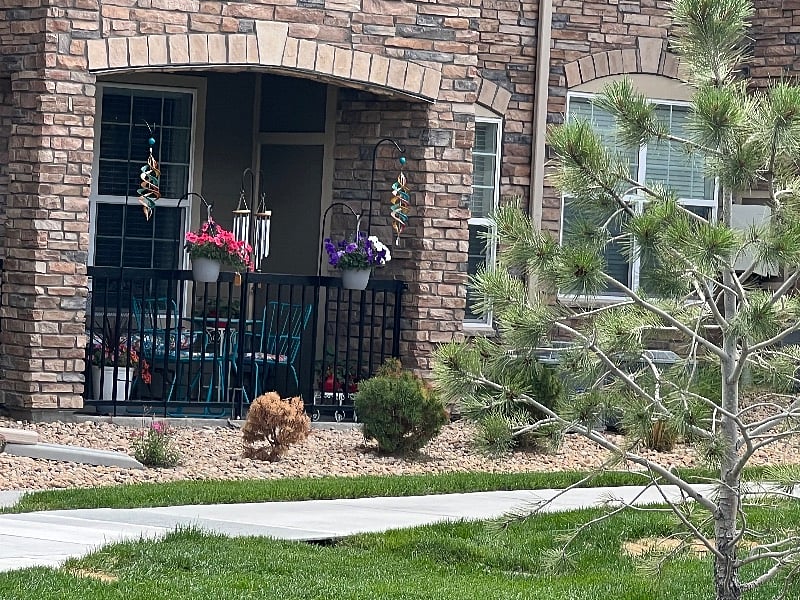 Neighbors porch, Plants and decor is allowed on patios
