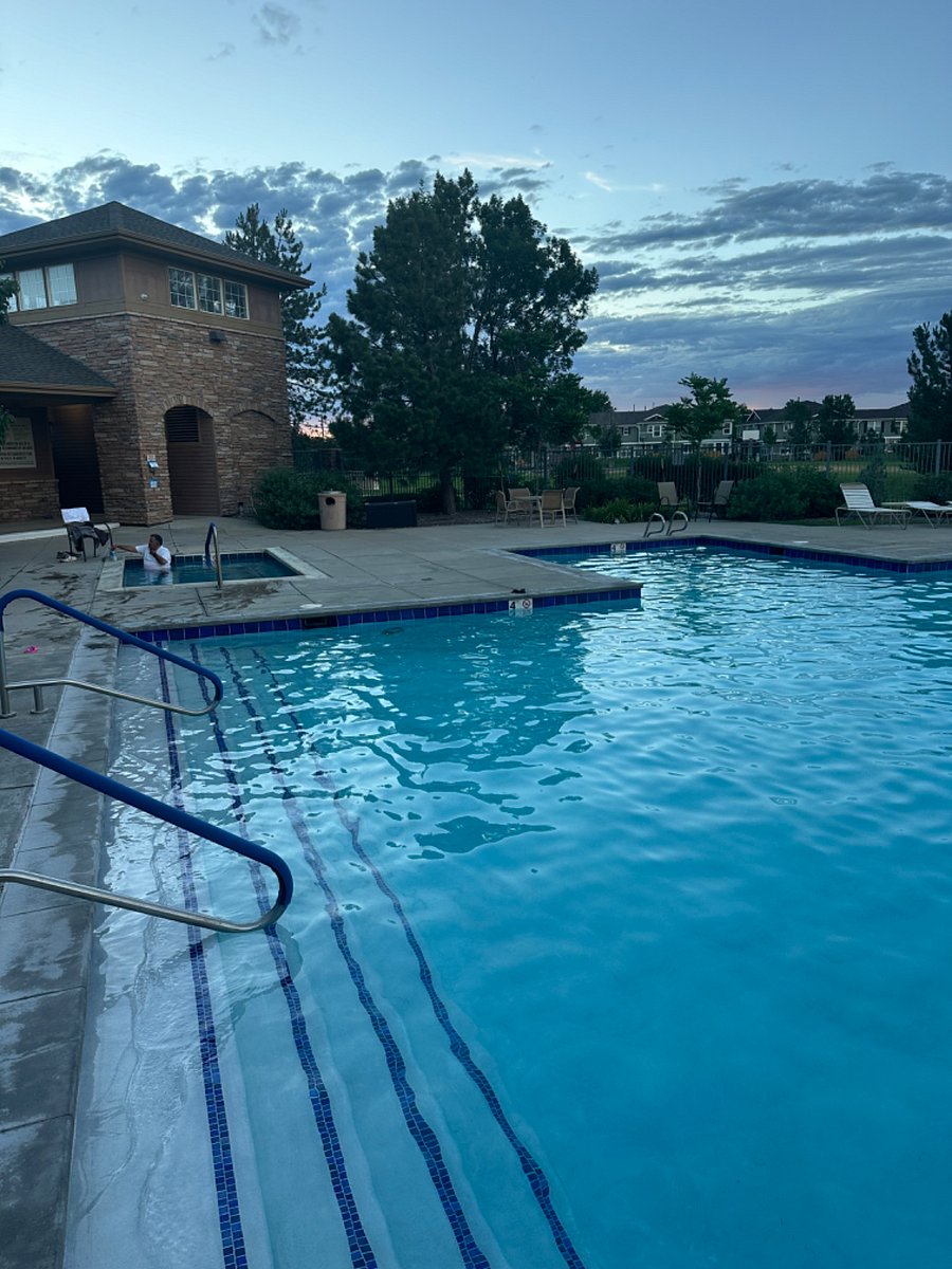 Large swimming Pool Area with lots of seating