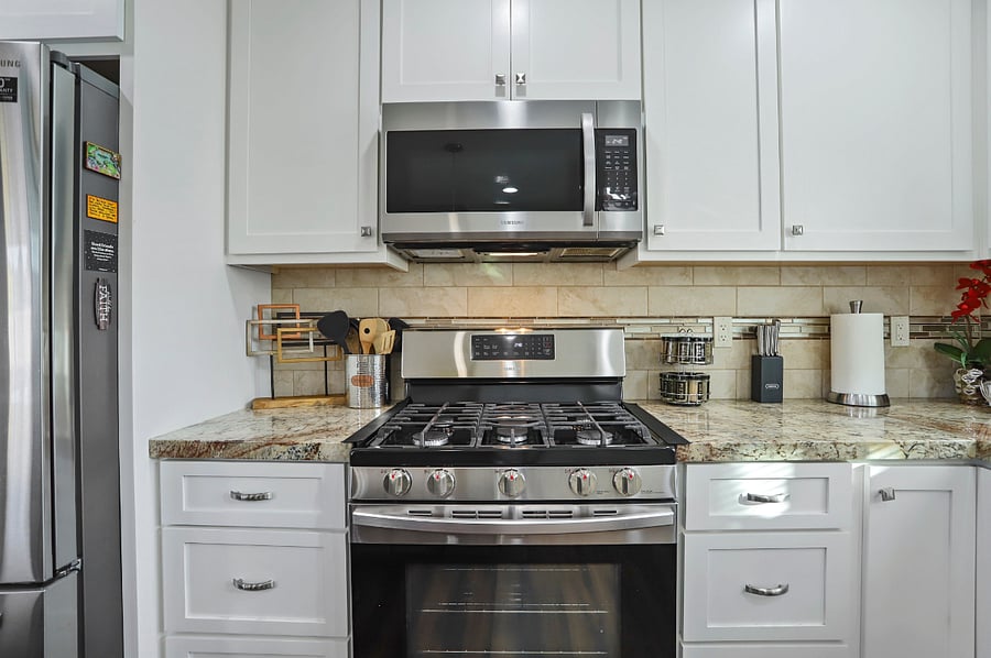 Refrigerator, gas 5-burner stove, dishwasher
