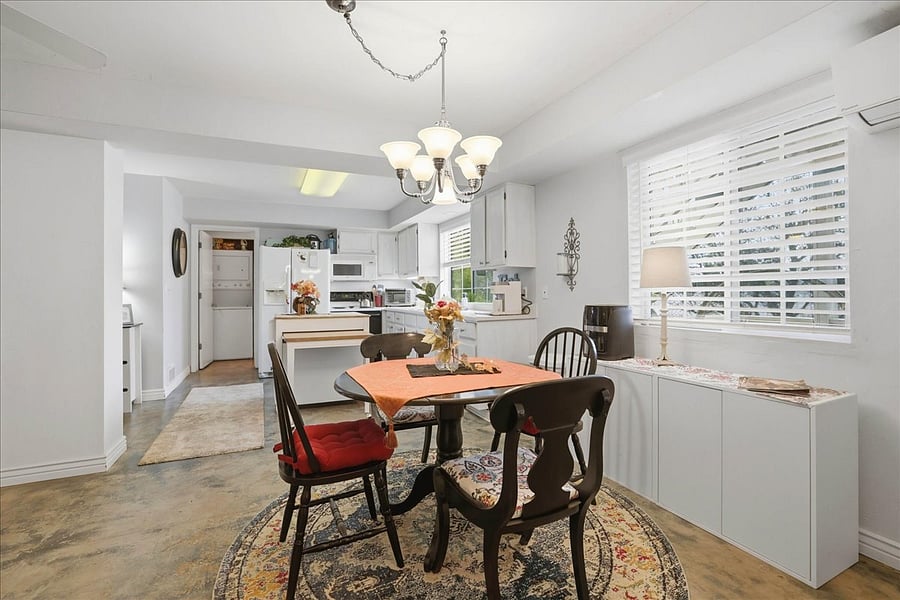 Walk in with small dining table, full kitchen and lots of windows! Overlooks porch and back yard! Views of trees from the deck!