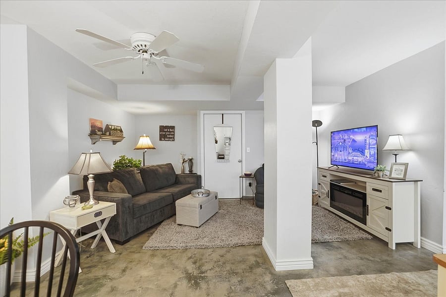 Comfy Living room couch turns into a Queen size bed for guests. Open room is great and bright!