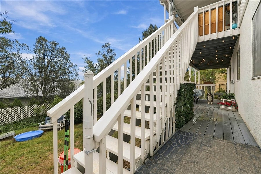 Up going staircase is our back stairs to the lower yard level - rarely used.
The lower entry is private - we don't see our tenants from here - the gate here has a security light above it that comes on upon your arrival to the walkway to your unit!
