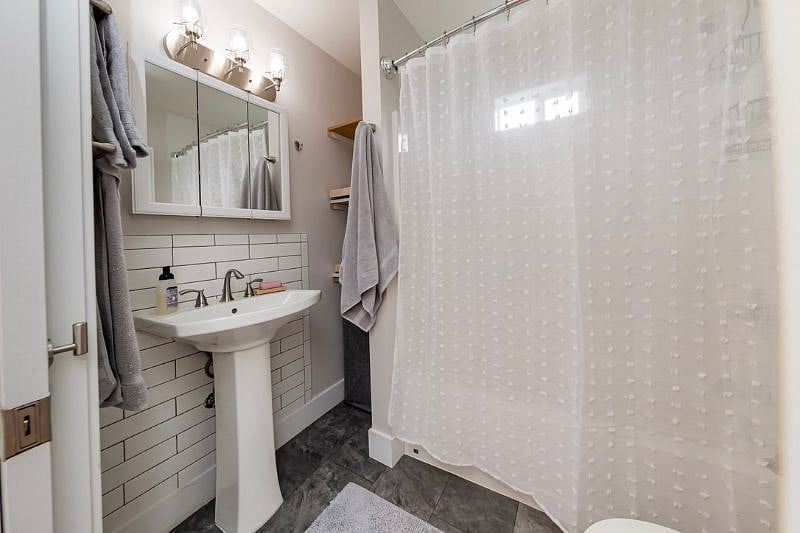 Cabinets and pull out shelves to store your toiletries.