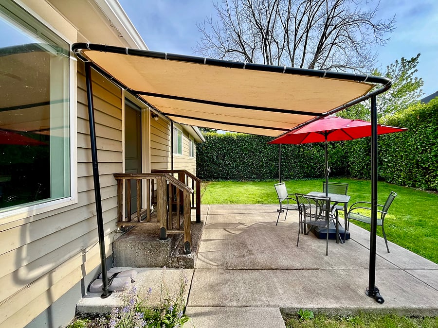 Patio canopy added for shade.