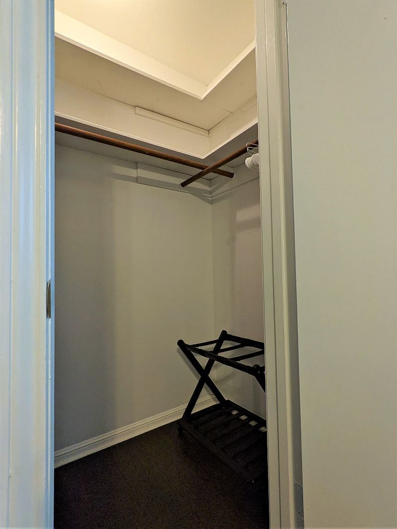 Guest Room #2:  Walk-in closet space with luggage rack