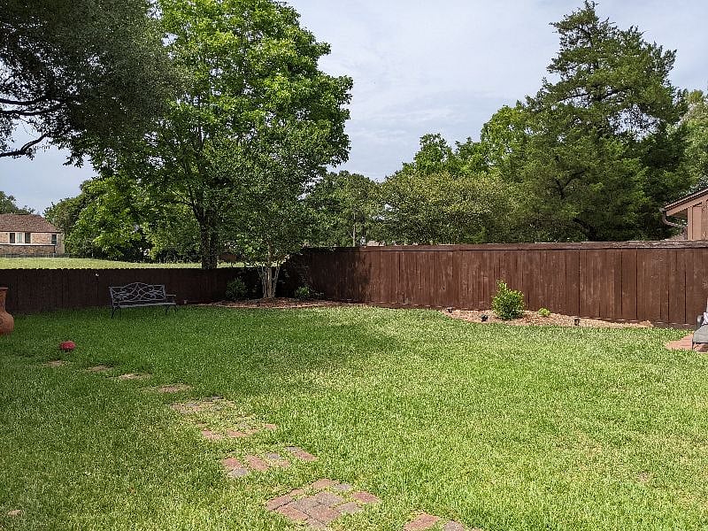 Shared space: Beautiful, well-maintained large fully fenced backyard with seating and lounge chairs for peace and quiet relaxation. 