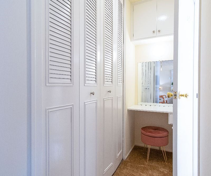Ample closet space and dedicated vanity area.