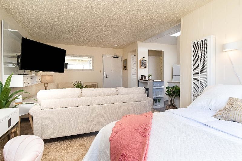 You can watch TV from the living room or bedrrom area just extend the TV and adjust to achieve the perfect viewing angle.