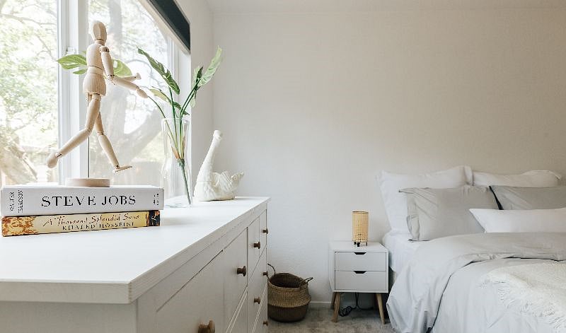 Bedroom 2 features a double bed, new hybrid medium firm mattress, comfortable bedding, beautiful Ikea dresser and a large window with view to the fountain.