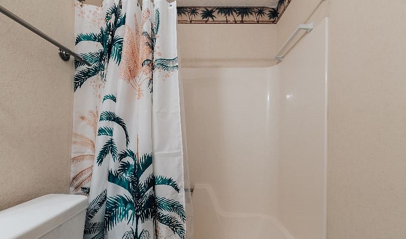 Bathroom 2 situated in the hallway is beautifully furnished and providing you with all essential toiletries.